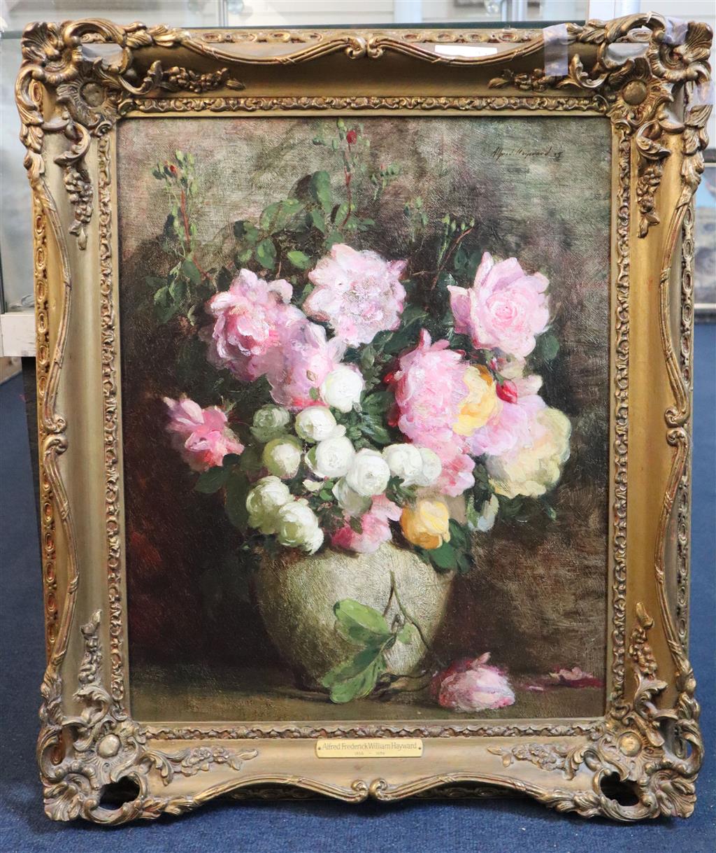 Alfred Hayward (1875-1971) Still life of roses in a white vase 20.5 x 16.5in.